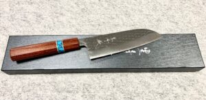 Yu Kurosaki Gyuto  R2/SPG2 acélból, "Senko"  kalapált  Padukfából  készült markolat, türkiz betéttel.